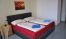 A bed Privatzimmer - Standard-Zimmer - Ansicht 3